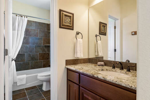 Master Bath 2 with a Granite Counter Vanity and Separate Tub/Shower Combo
