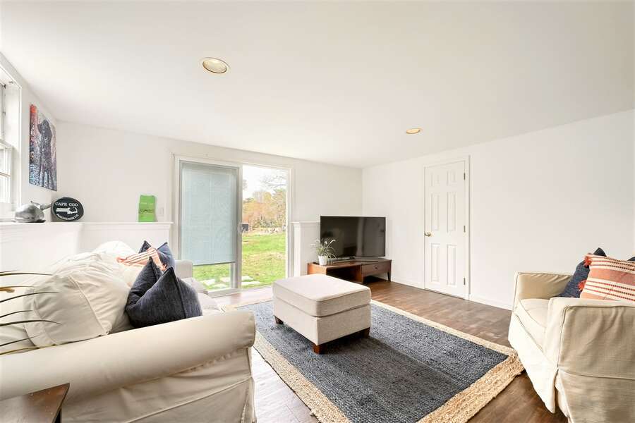 Lower level additional sitting area with TV - 671 Great Fields Rd Brewster Cape Cod - Beach Glass - New England Vacation Rentals