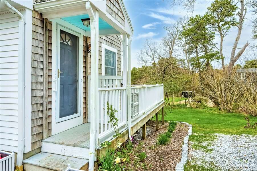 Side door into the family room and outdoor deck access as well - 671 Great Fields Rd Brewster Cape Cod - Beach Glass - New England Vacation Rentals