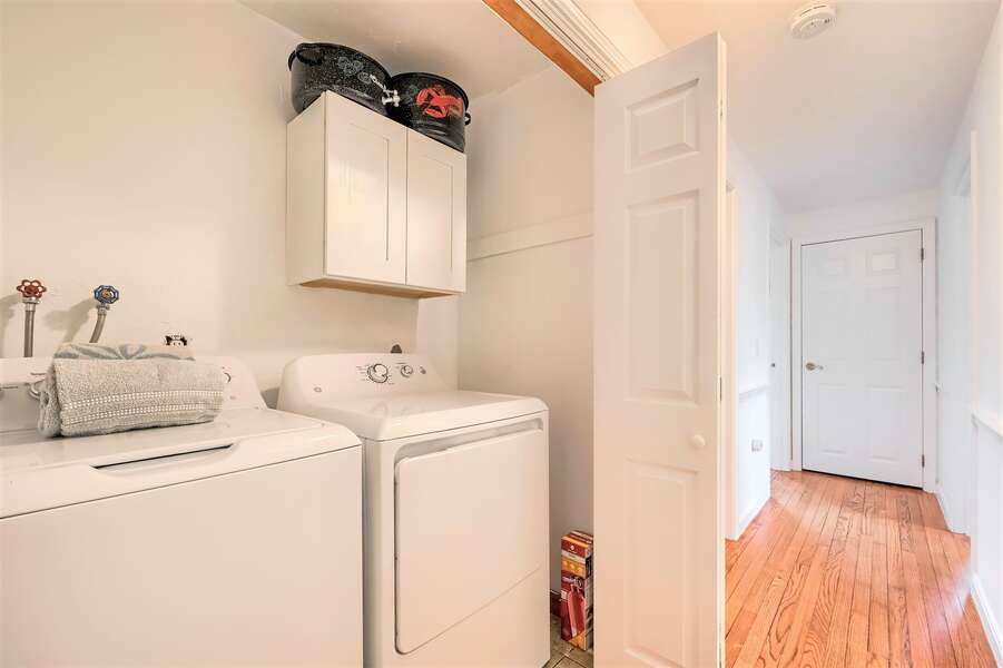 Laundry room in the hall closet on the main level - 671 Great Fields Rd Brewster Cape Cod - Beach Glass - New England Vacation Rentals