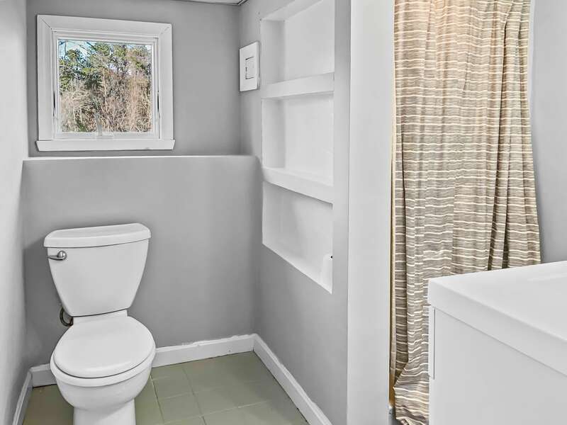 Lower level bathroom with shower - 671 Great Fields Rd Brewster Cape Cod - Beach Glass - New England Vacation Rentals