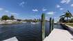 Major artery of the Punta Gorda canals leading out to Charlotte Harbor makes for fun boat watching all day