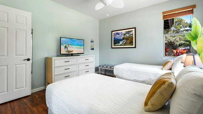 Guest bedroom with twin beds, Smart TV for streaming