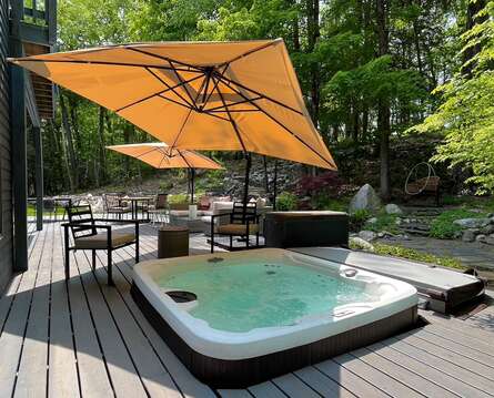 Patio lounge with grill, umbrellas, Hot Tub, bocci court, swing etc.