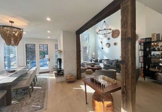 Open floor plan with great room, dining and double sided fireplace.