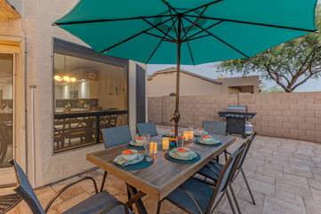 Grill your favorites on the gas BBQ and enjoy your feast at the outdoor dining table.