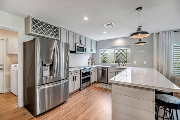 Kitchen with Stainless Steel Appliances Including Double Ovens