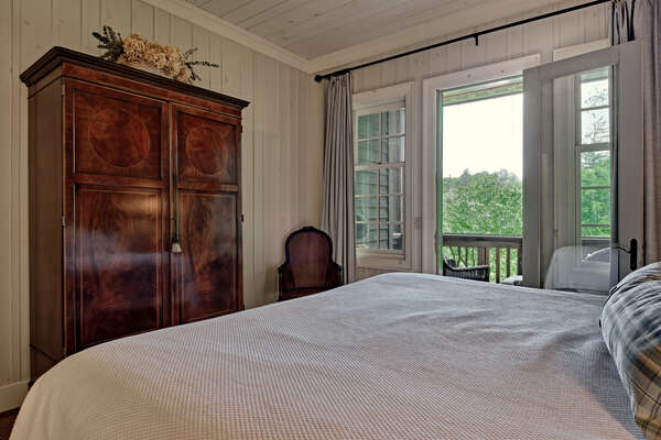 Master Bedroom with King bed and  access to deck.