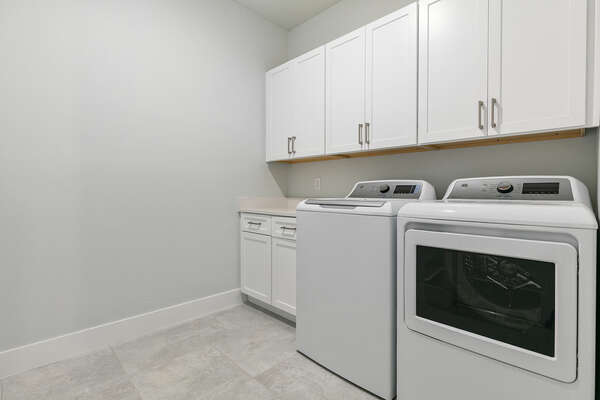 Full sized washer and dryer on the first floor for convenience.