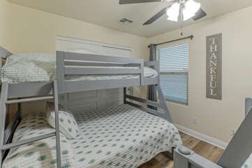Bedroom 4 has 2 twin over full bunk beds and shares Bathroom 2 with Bedrooms 2 and 3.