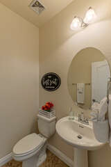Ground floor powder room is ideal for guests using the pool or invited visitors.