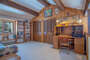 If you must bring your work with you, get comfortable in this study that includes a queen sofa bed!