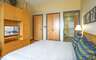 Master Bedroom #1 with a king-size bed and a private bathroom.
