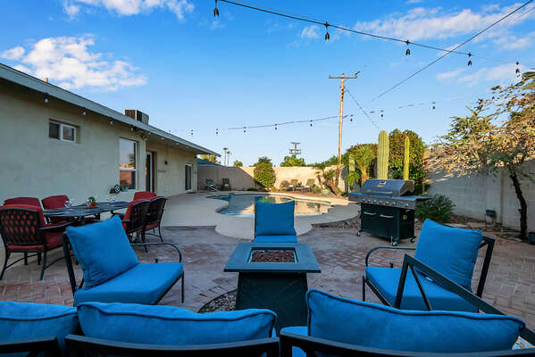 Fire pit area, stringer lights and heated pool!