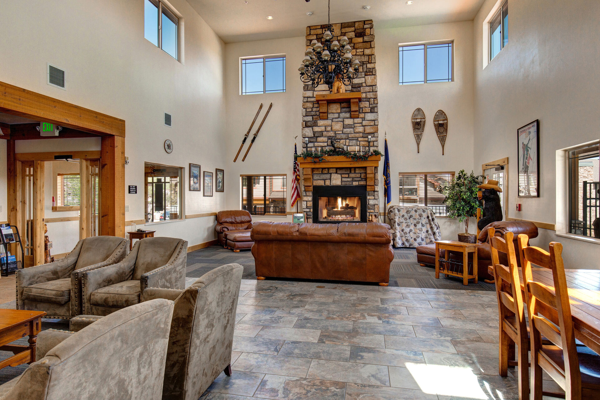 Bear Hollow Clubhouse with lobby/sitting area, seasonal pool, hot tub, and fitness center