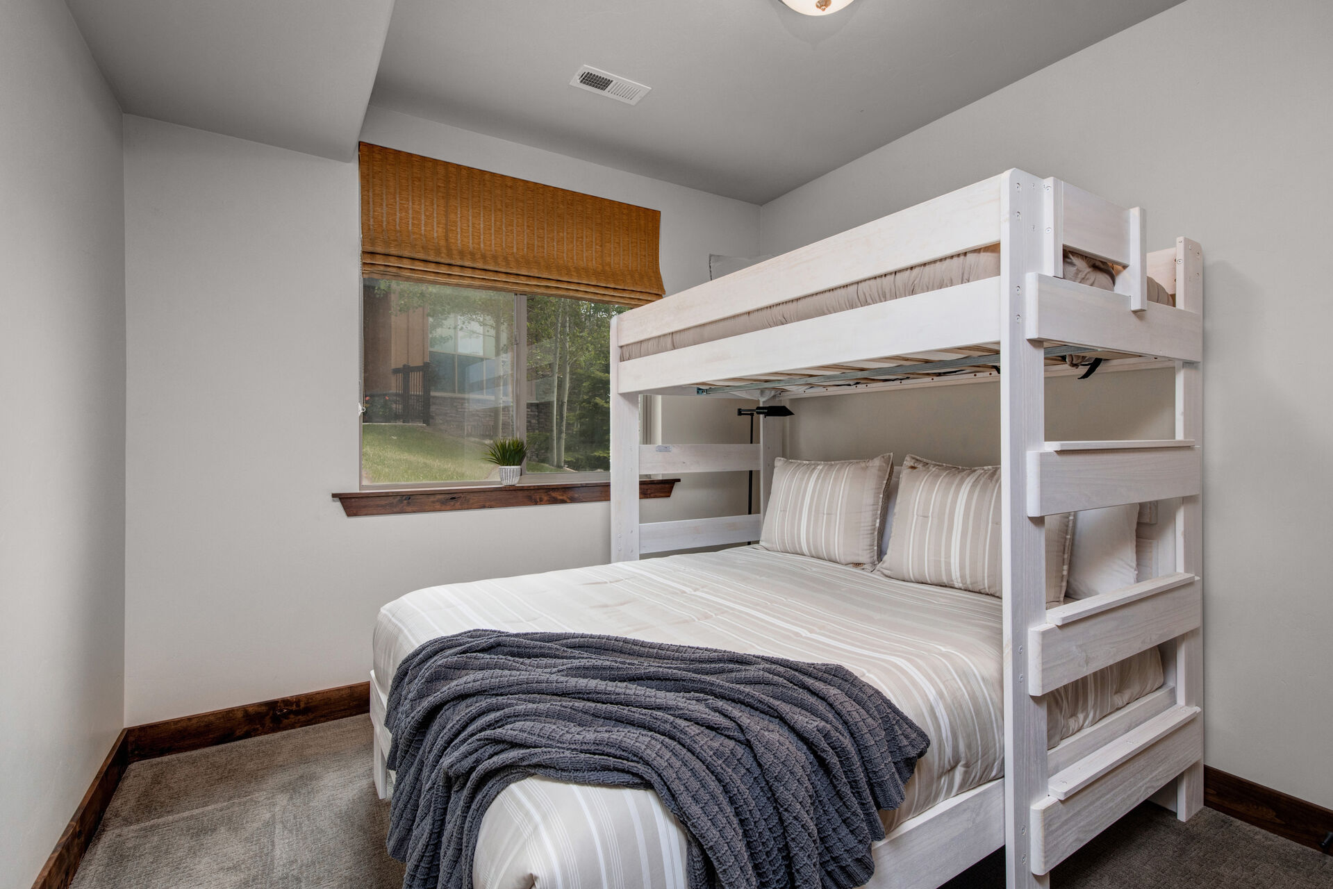 Lower Level Bedroom 3 with twin over queen bunkbed and full bath access