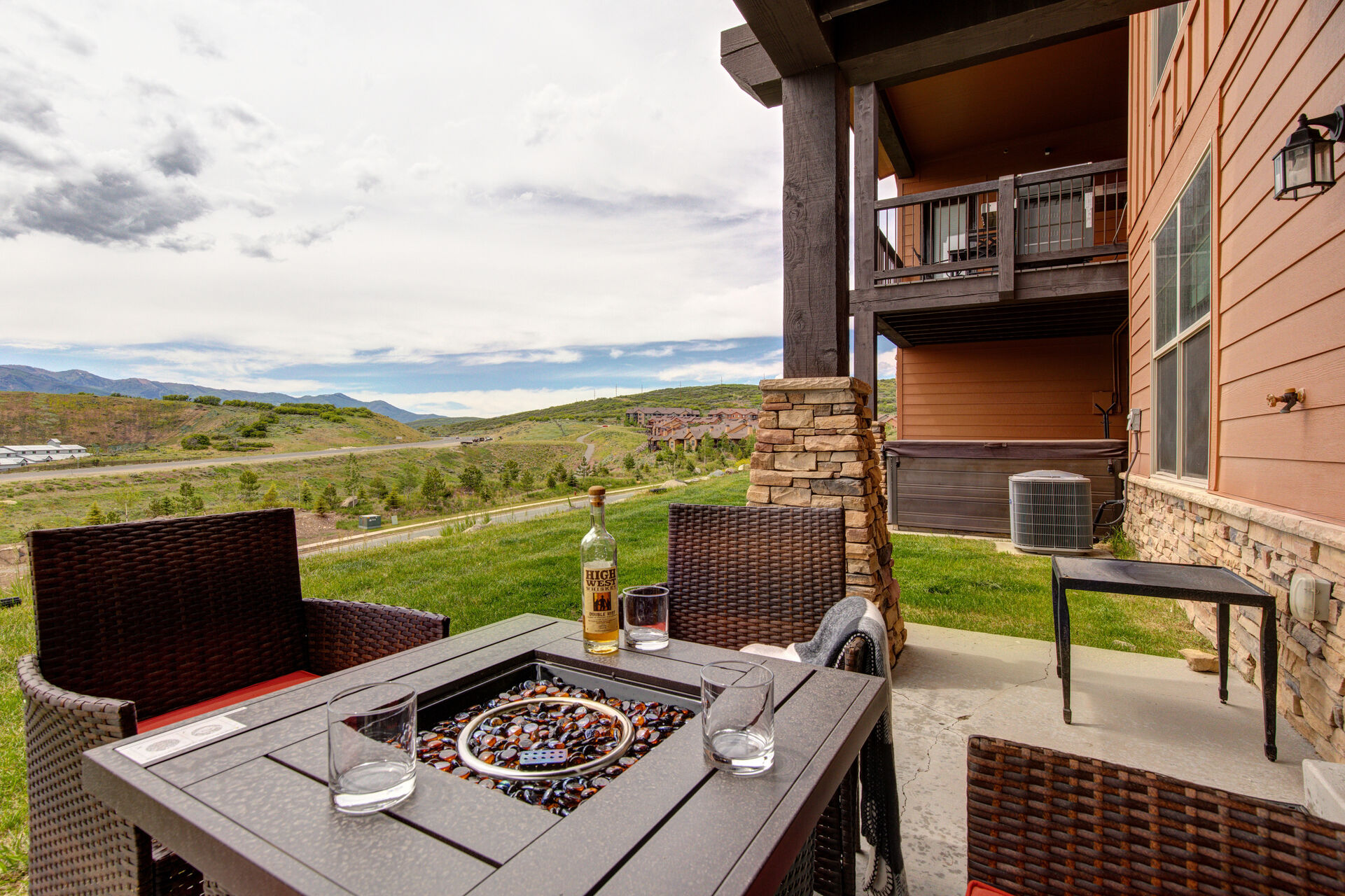 Private Patio with firepit, stunning mountain views, and seating for four