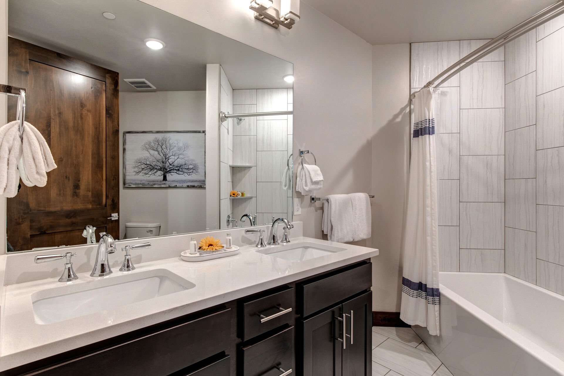 Master Bathroom with double sinks and shower/tub combo