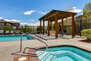 Bear Hollow Clubhouse with lobby/sitting area, seasonal pool, hot tub, and fitness center