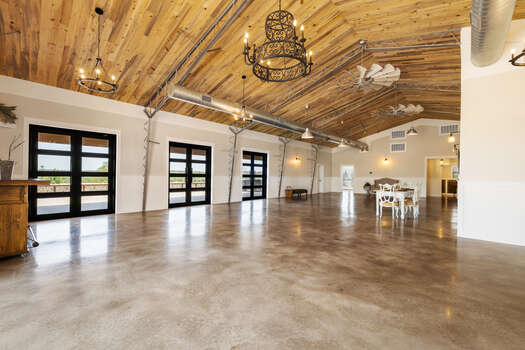 Custom Double French Doors, Painted/Polished Concrete Flooring and High Ceiling