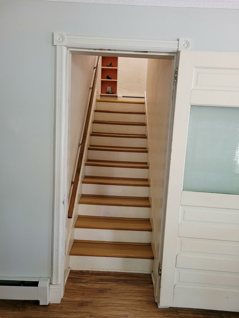 *Please disregard that the photo is crooked. Stairs to the second level. First set
