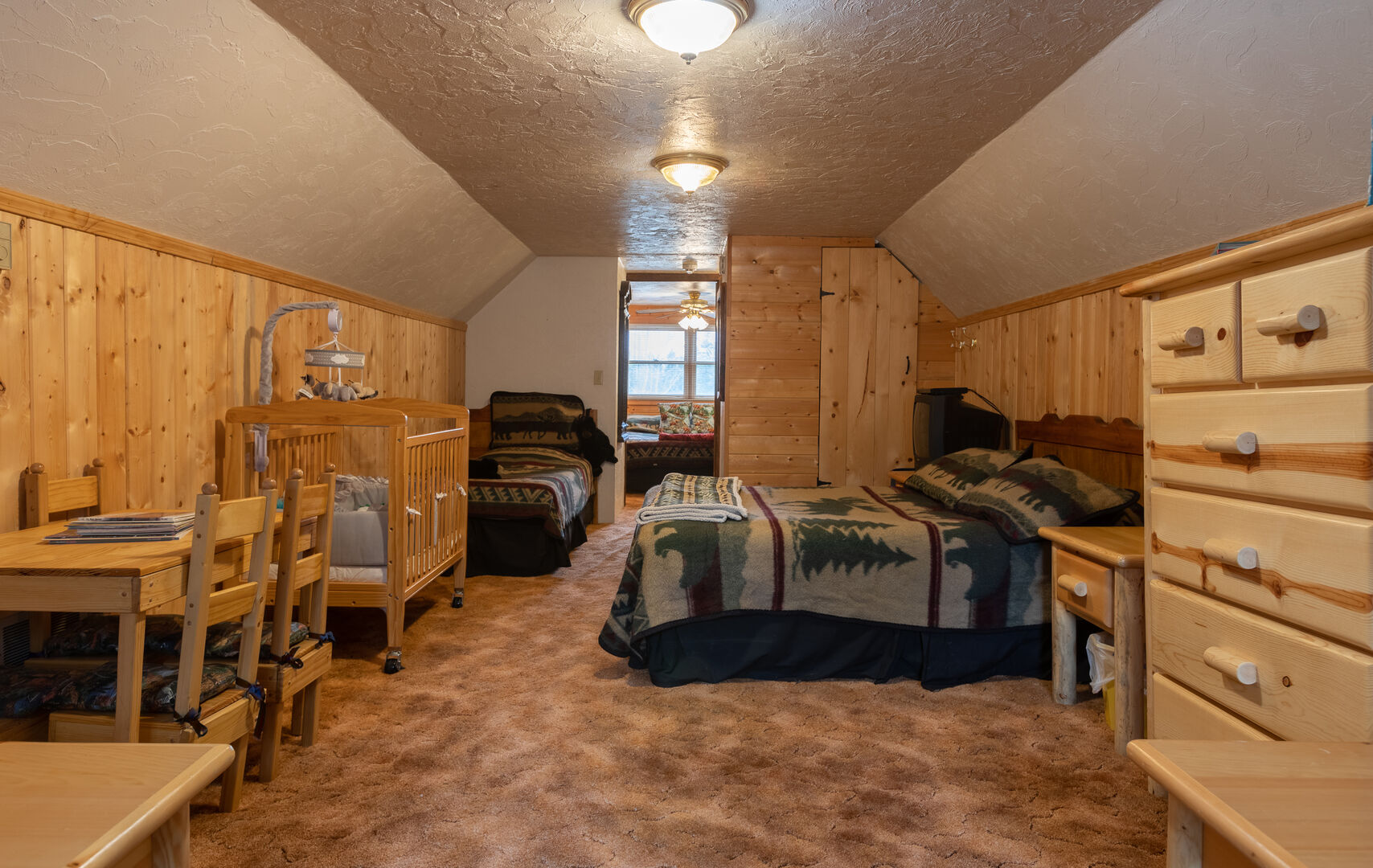 Remington Reload ~ upper level loft w/ full bed and 3 twin beds (considering this a bedroom)