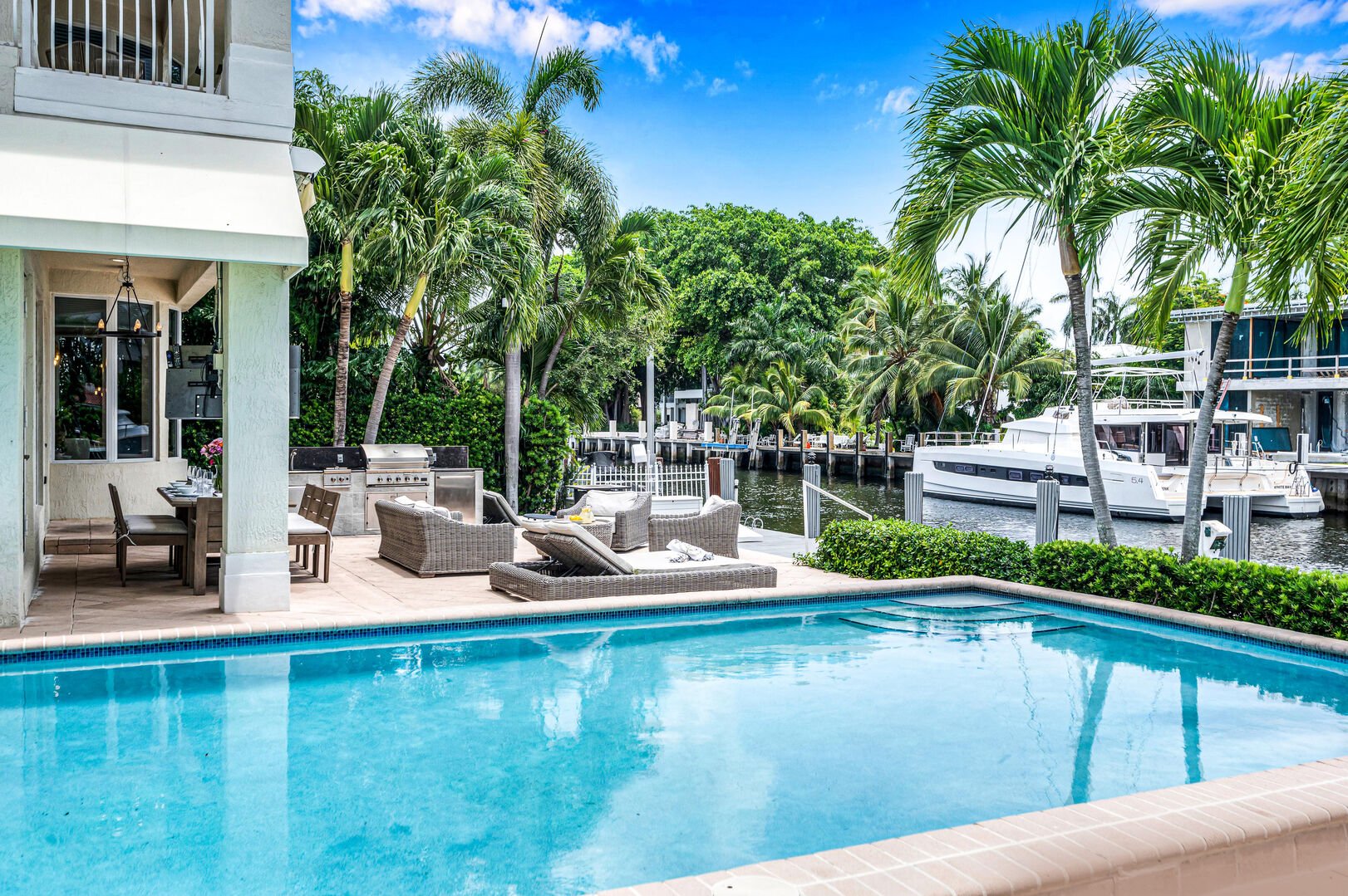 Relish in waterfront tranquility from the heated pool and lounge areas.