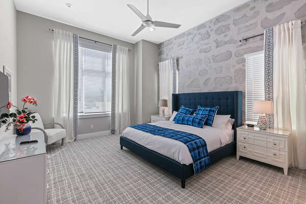This Greek themed master suite features a king size bed and en-suite bathroom. Located on the first floor.