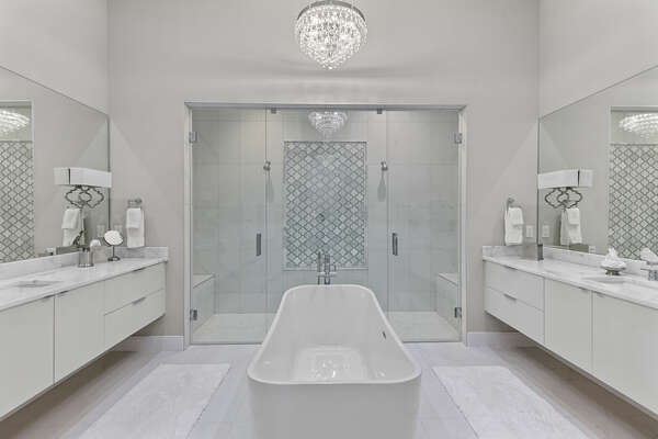En-suite bathroom with spacious walk in shower and soaking tub