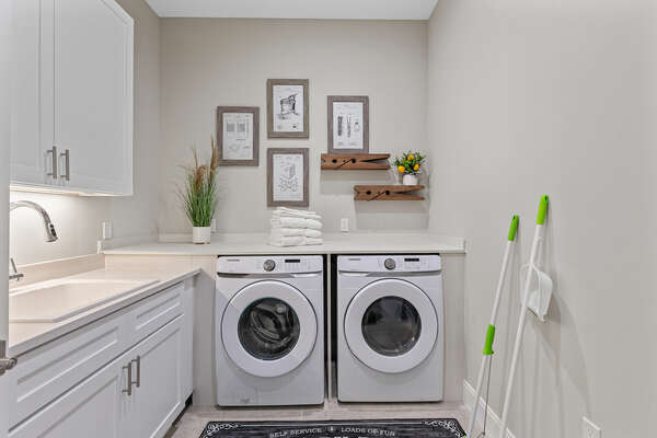 For your convenience, the home comes equipped with a full-sized washer and dryer
