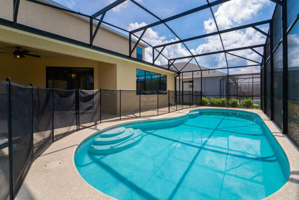 View of pool with safety fence in place