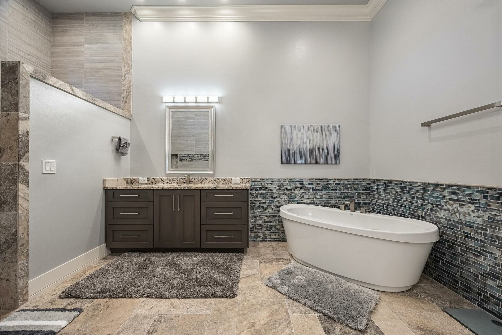 master bathroom with soaking tub and shower