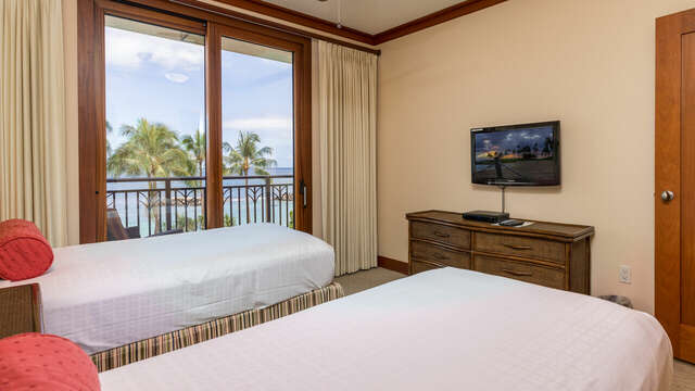 Bedroom 2 with two twin beds, and beautiful ocean view