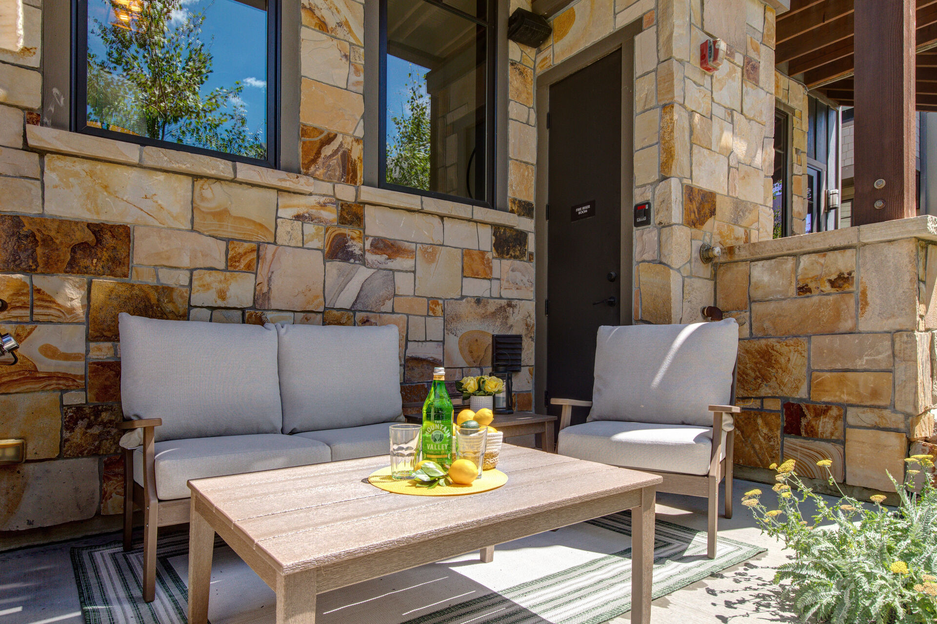 Private Patio with gas Weber grill and beautiful outdoor furnishings