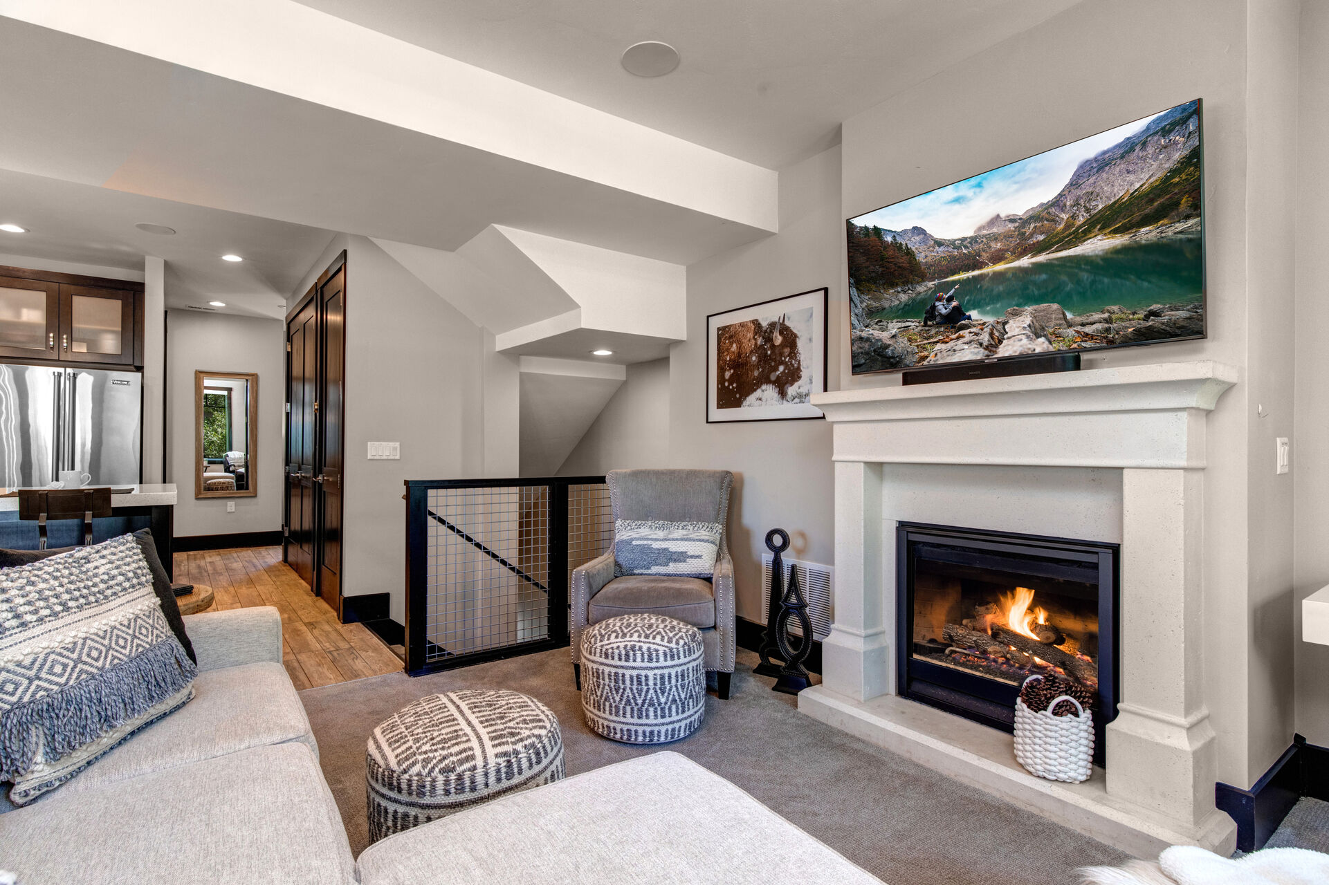 Living Room with plush, modern furnishings, gas fireplace, 55