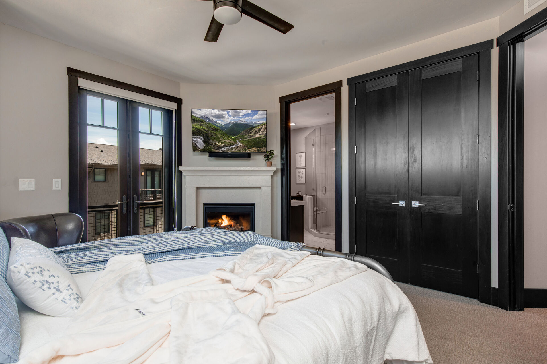 Upper Level Master Bedroom with king bed, gas fireplace, 50