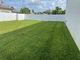 Large private backyard fenced in.
