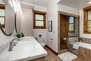 Upper Level Shared Bath with a Soaking Tub and Shower
