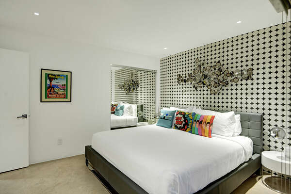 BEDROOM #4 KING WITH SLIDER THAT OPENS TO THE RESORT LIKE BACKYARD AND SMART TV