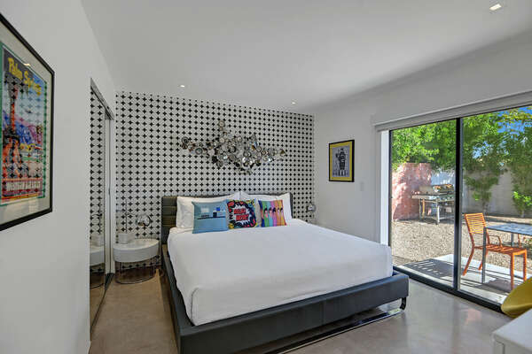 BEDROOM #4 KING WITH SLIDER THAT OPENS TO THE RESORT LIKE BACKYARD AND SMART TV
