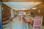 Dining area has seating for four and seating for two at the kitchen bar