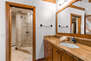 En Suite bathroom with large tile & glass shower