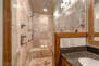 En Suite Bathroom with double sinks, and over sized tile shower