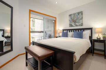 Second bedroom with queen bed and private balcony