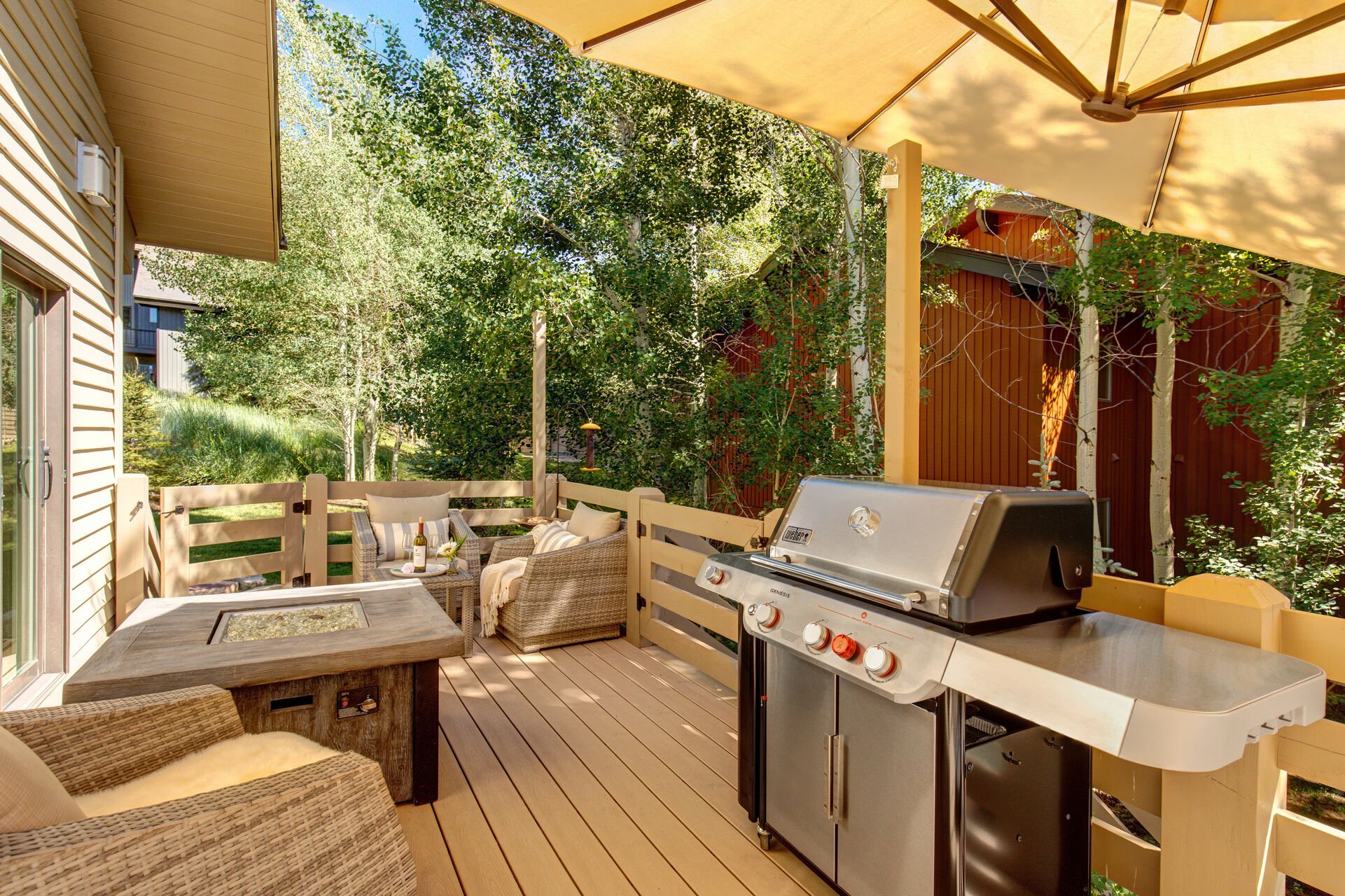 Main Level Deck with a Fire Table and BBQ
