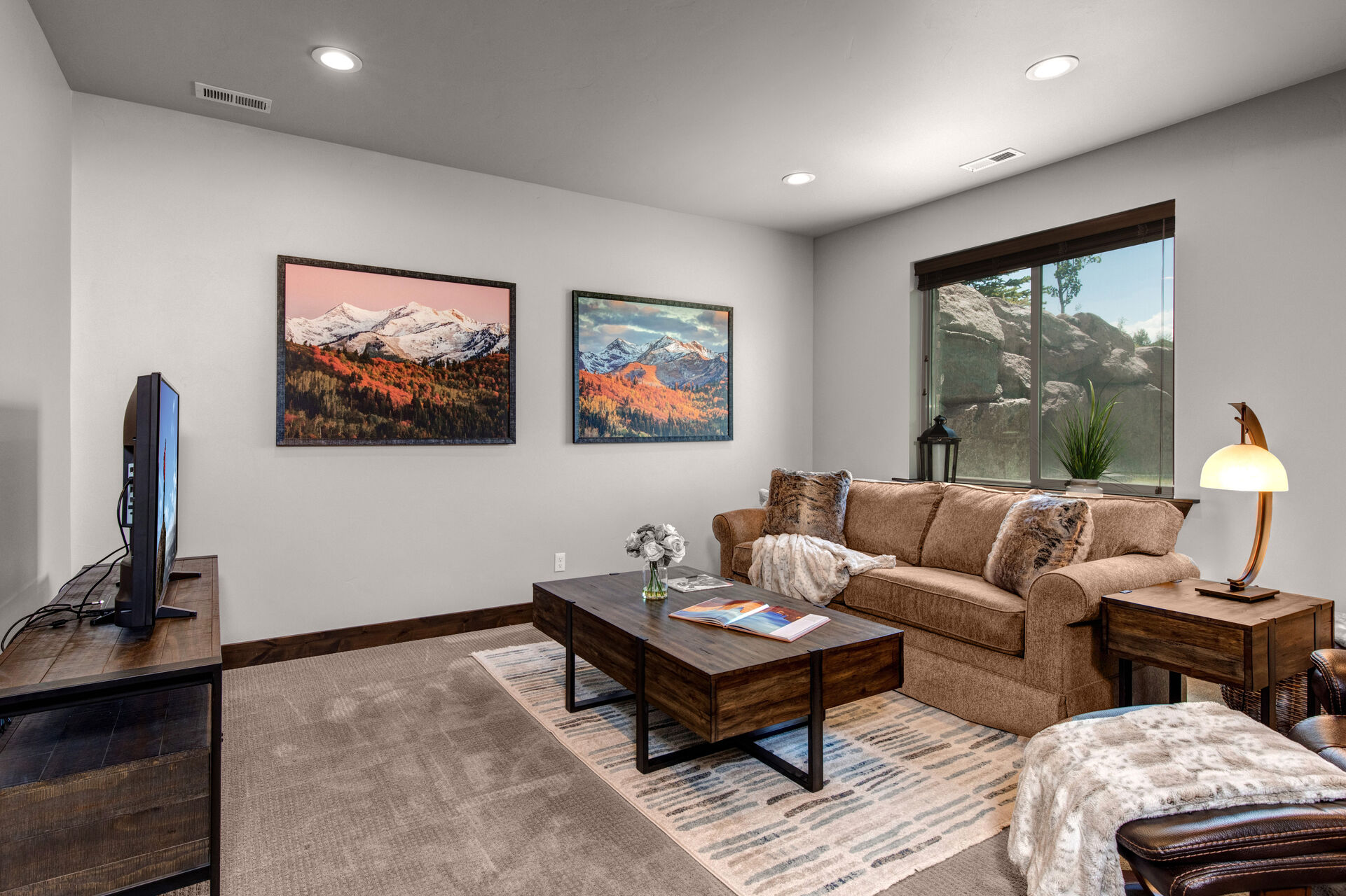 Lower Level Family Room with a Sleeper Sofa and Smart TV