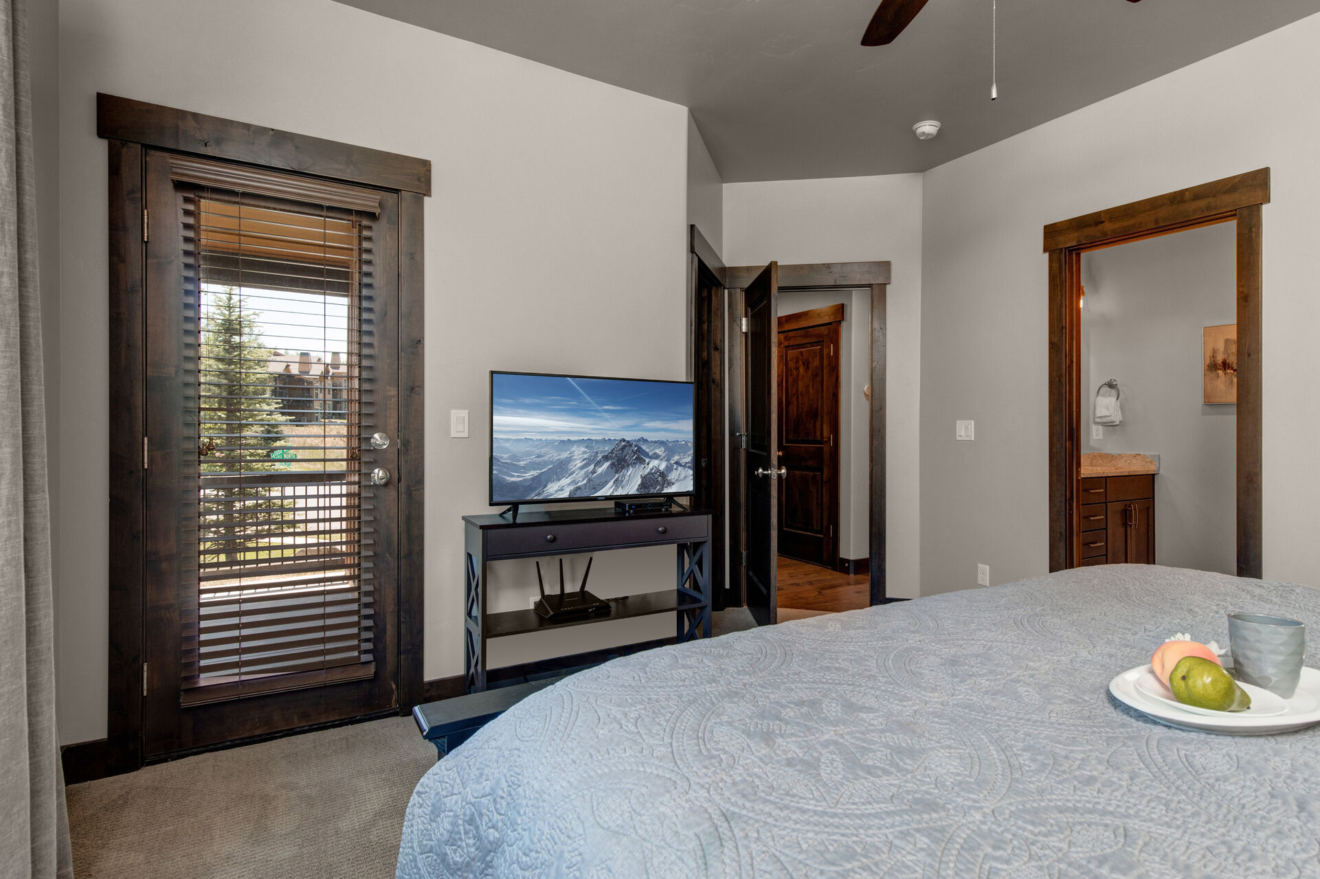 Master Bedroom with a Smart TV, Patio Access and a Private Bath