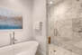 Grand Master Bath with a Tile/Glass Shower with Two Shower Heads