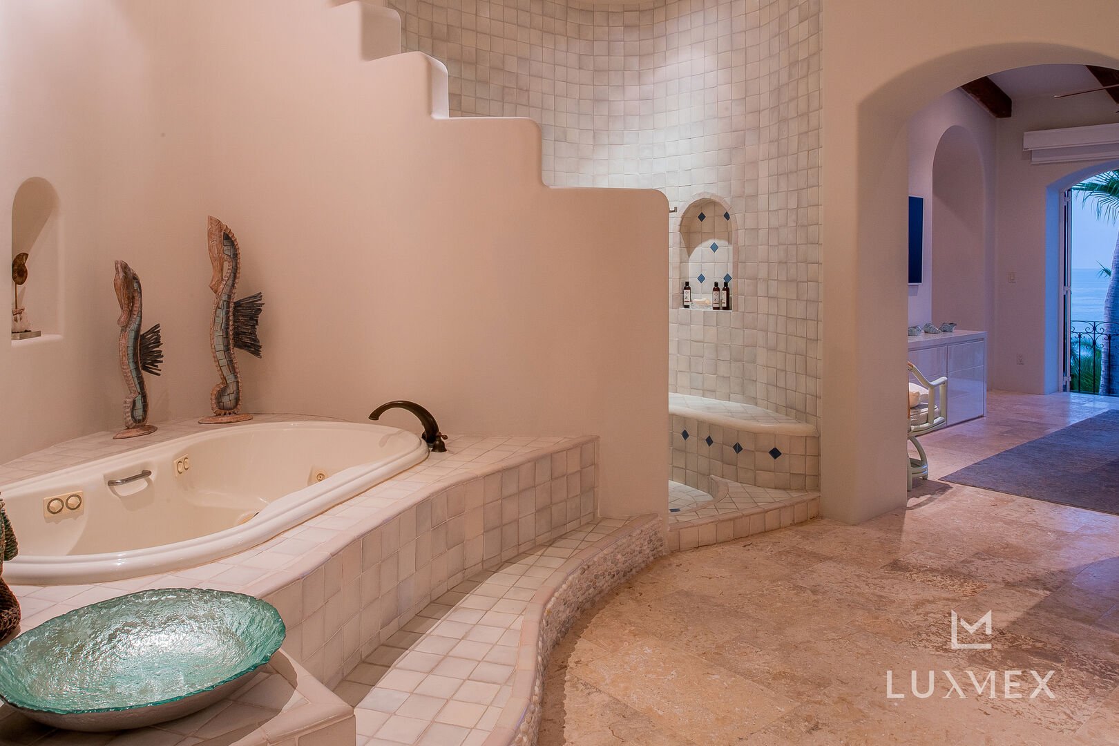 The ornate bathtub area of the master bath of this Los Cabos Luxury Vacation Villa.