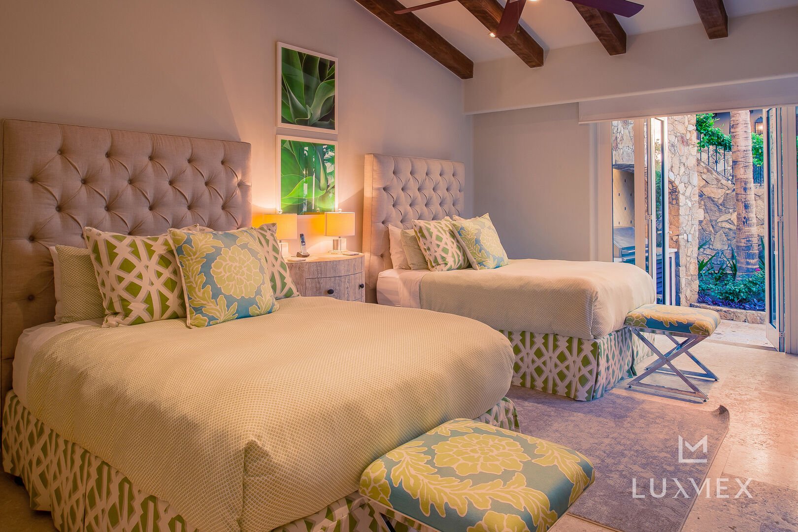 Two beds side by side in one of the bedrooms of this Los Cabos Luxury Vacation Villa.